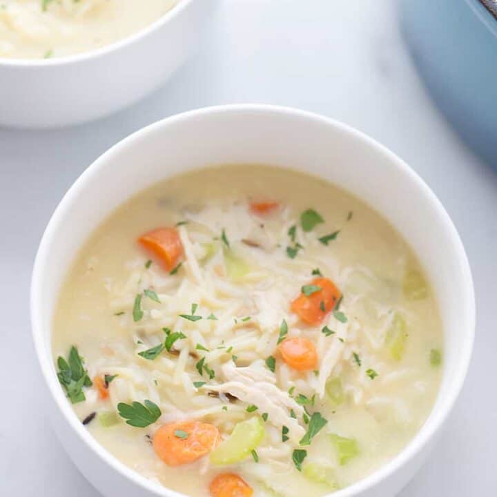 Easy Creamy Chicken Noodle and Rice Soup - Need a comforting weeknight meal that's also quick and easy? Give this creamy chicken noodle and rice soup a try! #soup #chickensoup #chickennoodlesoup #easyrecipe #halfscratched #maindish #easysoup #souprecipe