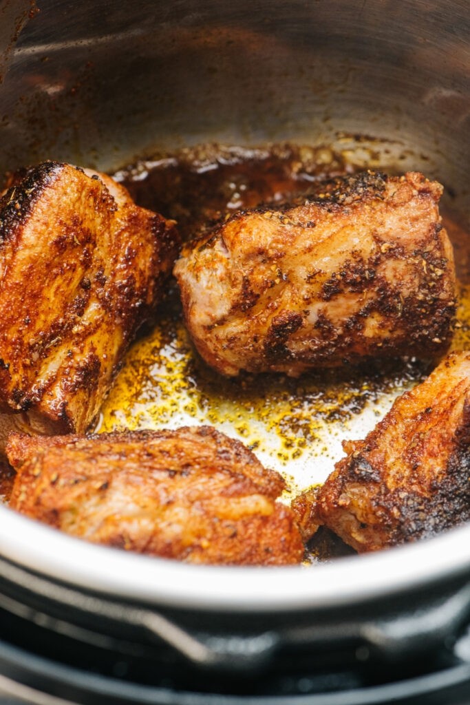 Slices of pork butt in instant pot