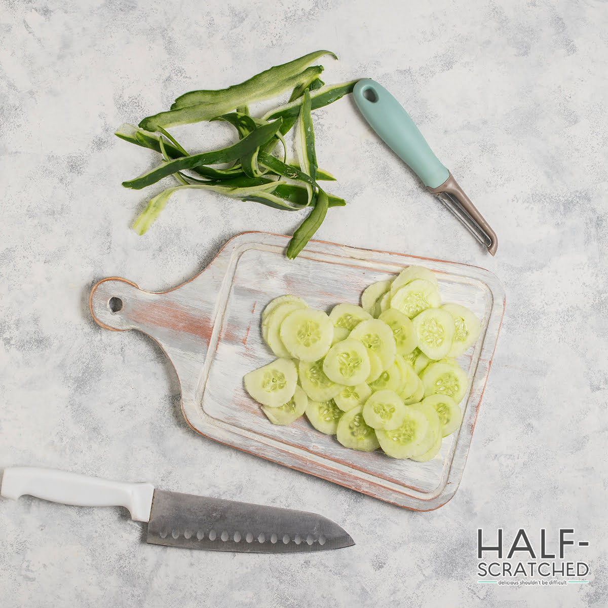 English cucumber and peel it using a knife or peeler