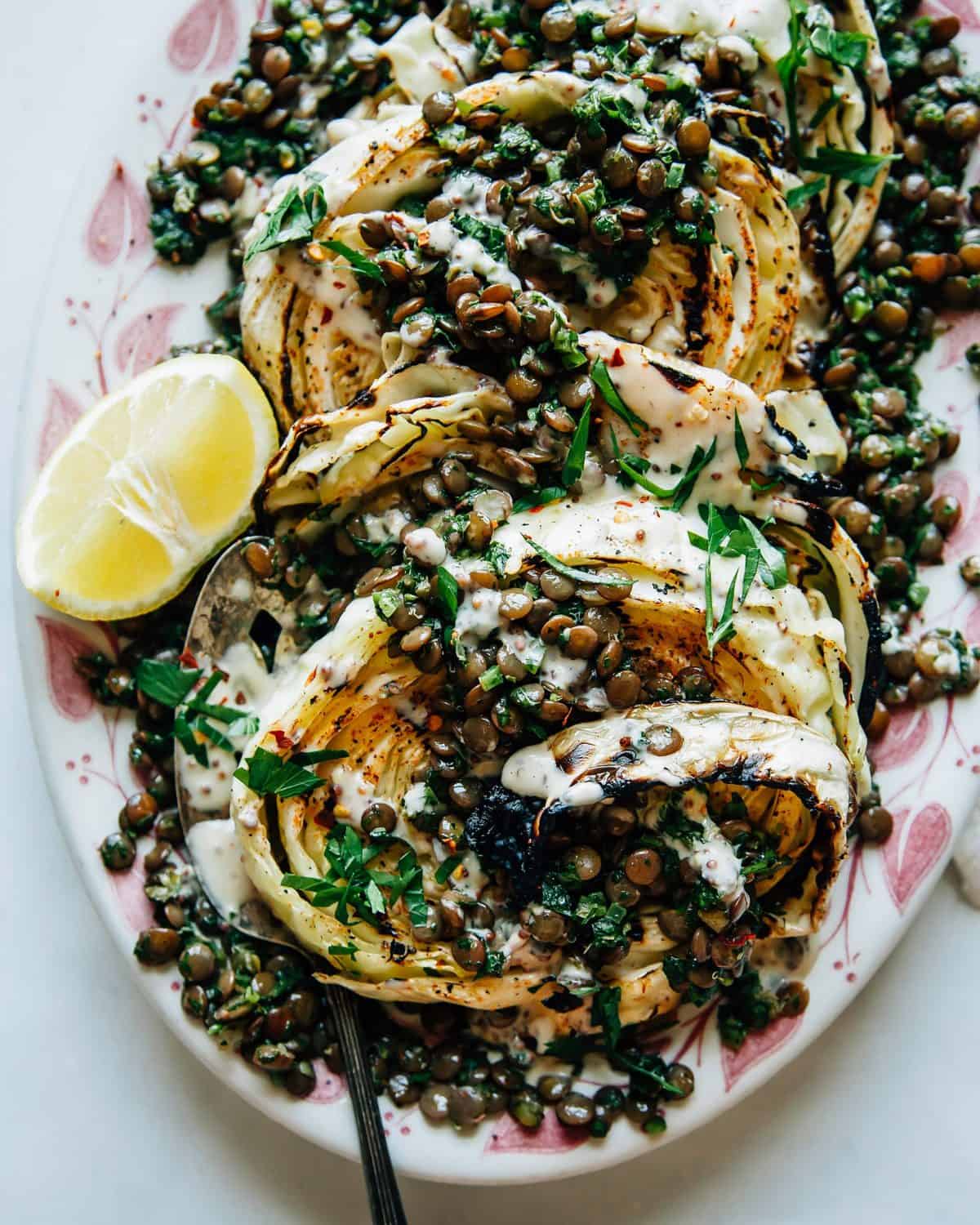 Grilled Cabbage Steaks with Jalapeño Chimichurri Lentils and Maple Mustard Tahini