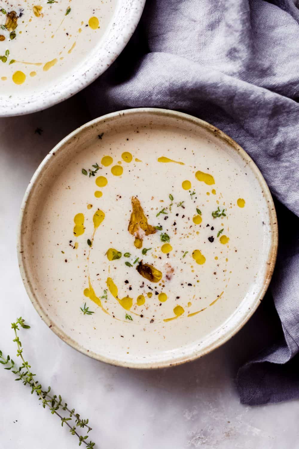 Soul-Warming Cauliflower Soup with Roasted Garlic and Truffle Oil