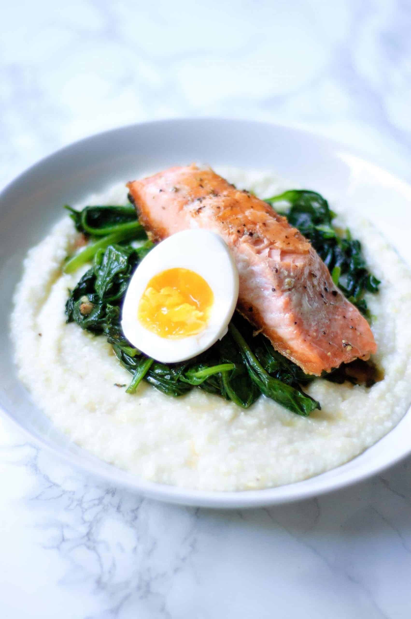Salmon and Grits with Garlicky Greens & Boiled Eggs