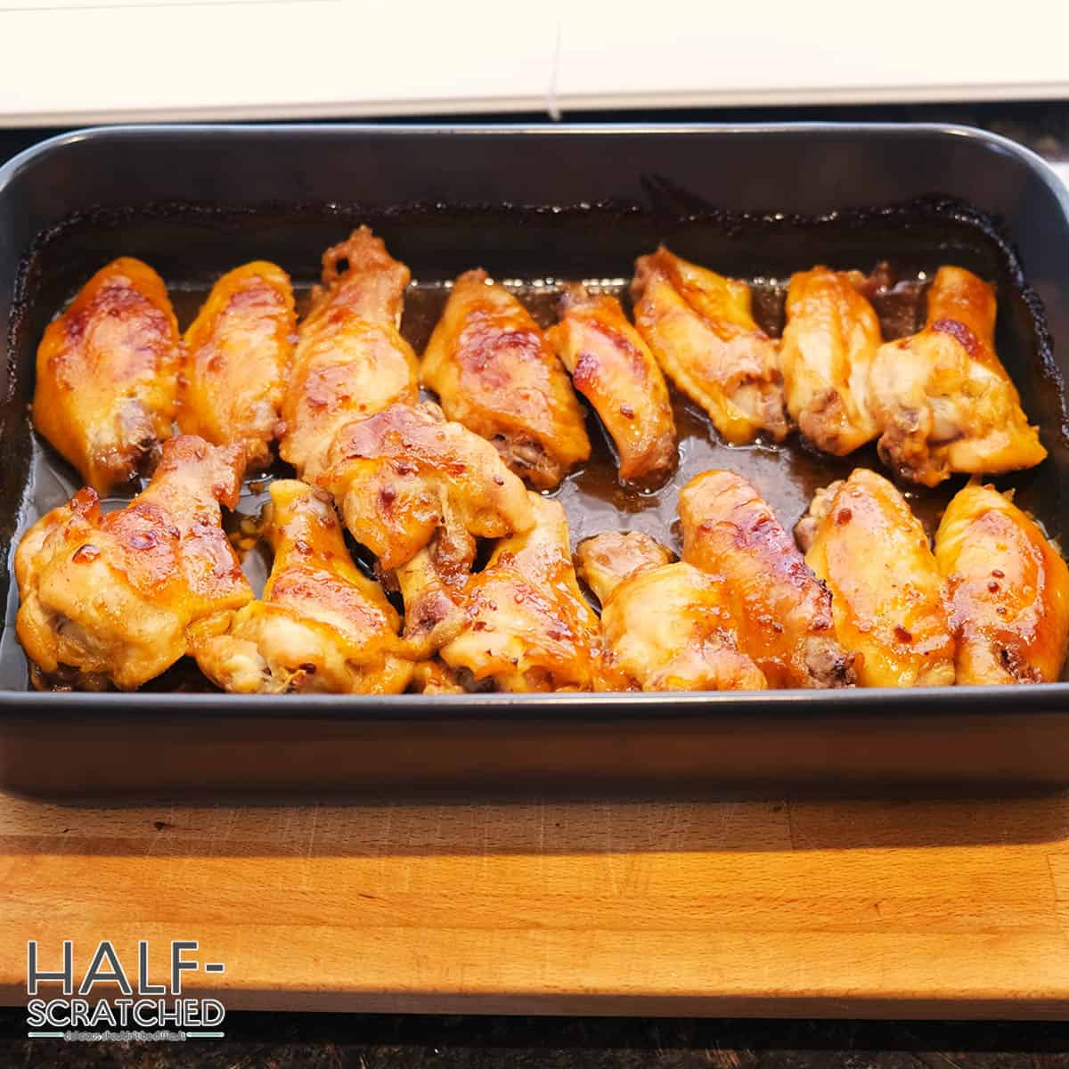 Chicken wings on a baking tray