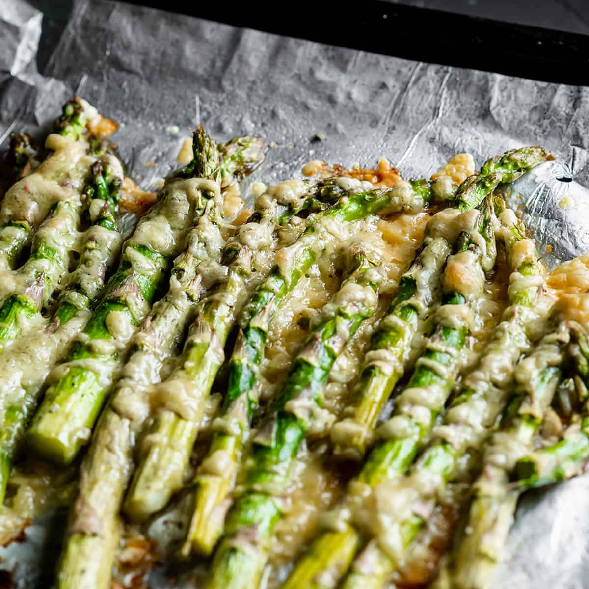 Asparagus in oven with cheese on top