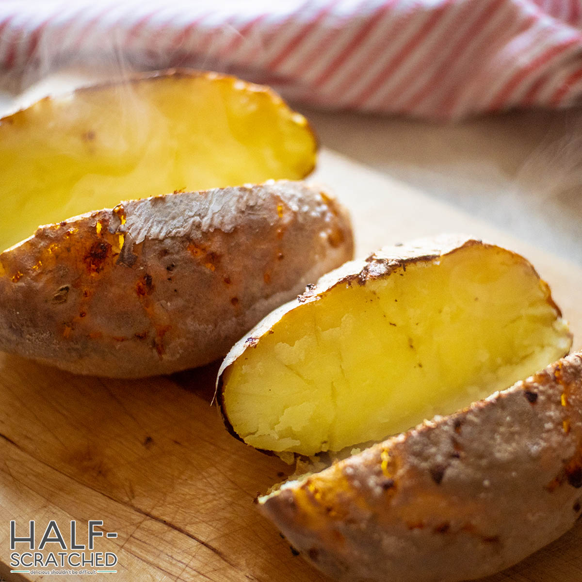 Halved oven baked potatoes
