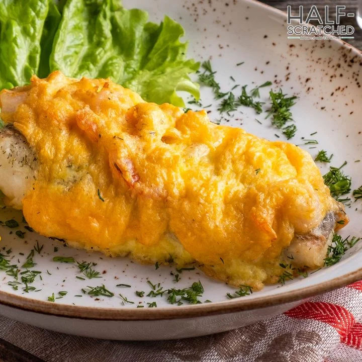 Cod covered with cheese