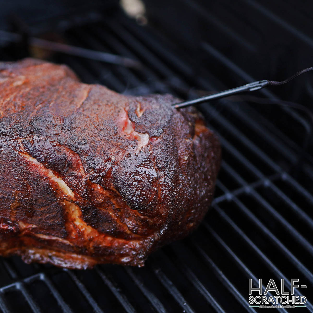 Boston butt with a meat thermometer