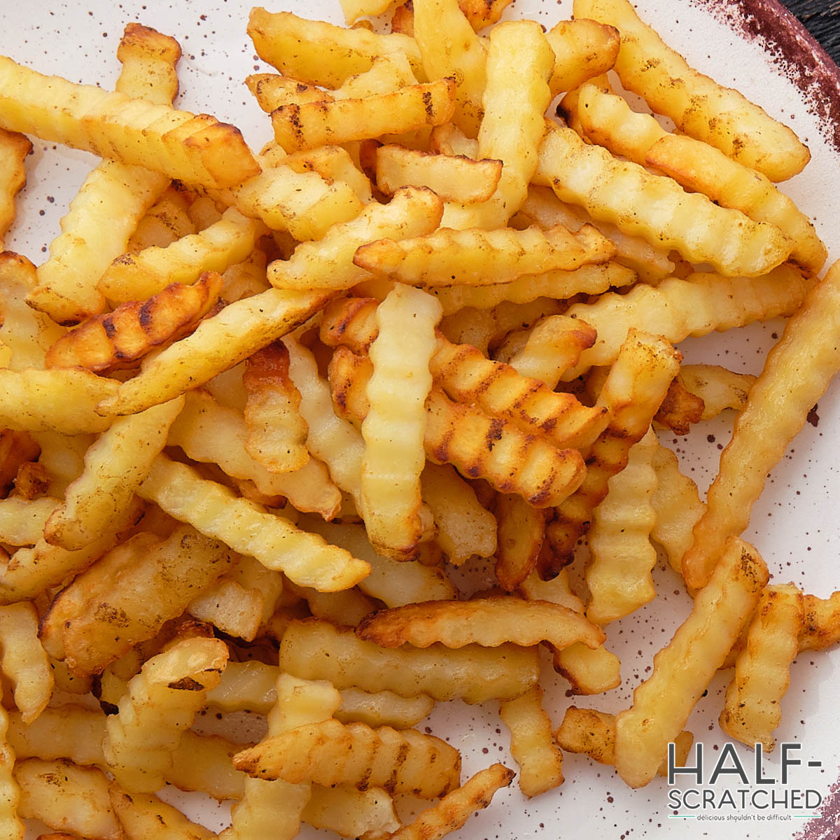 Frozen crinkle cut french fries in oven at 400F