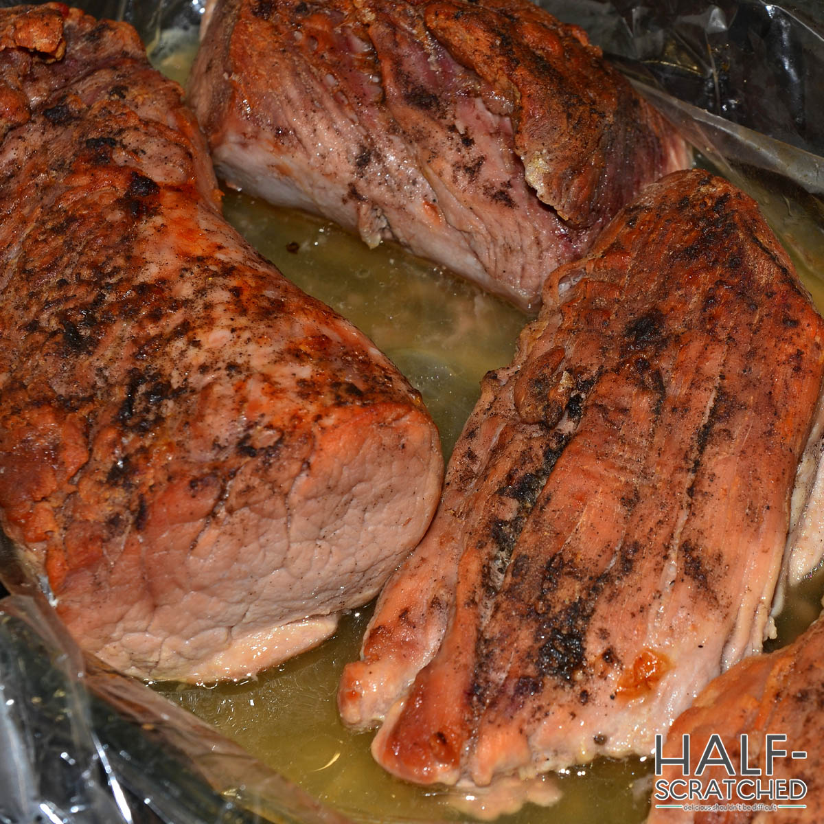 Pork tenderloins cooking in the oven