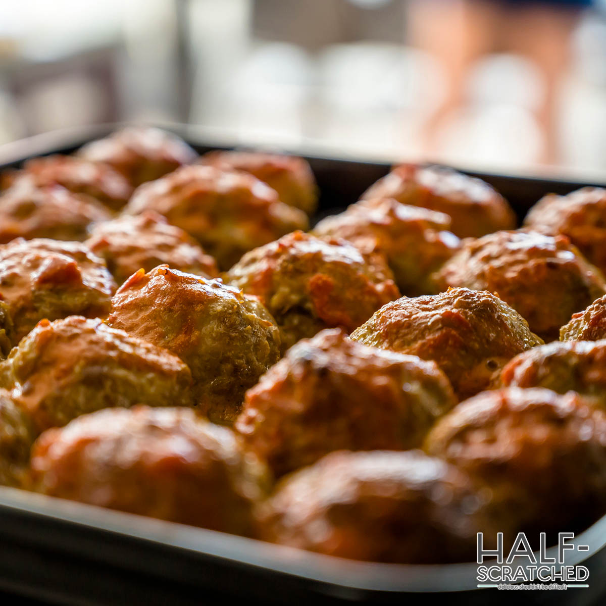 Close up of meatballs on an oven tray
