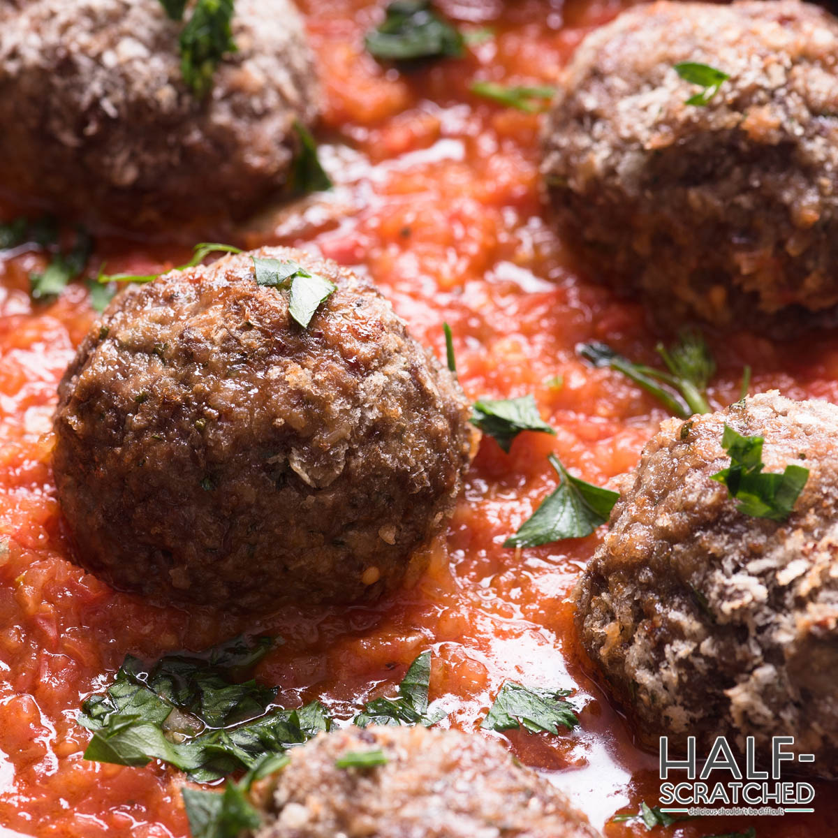 Meatballs in the oven at 400F with sauce