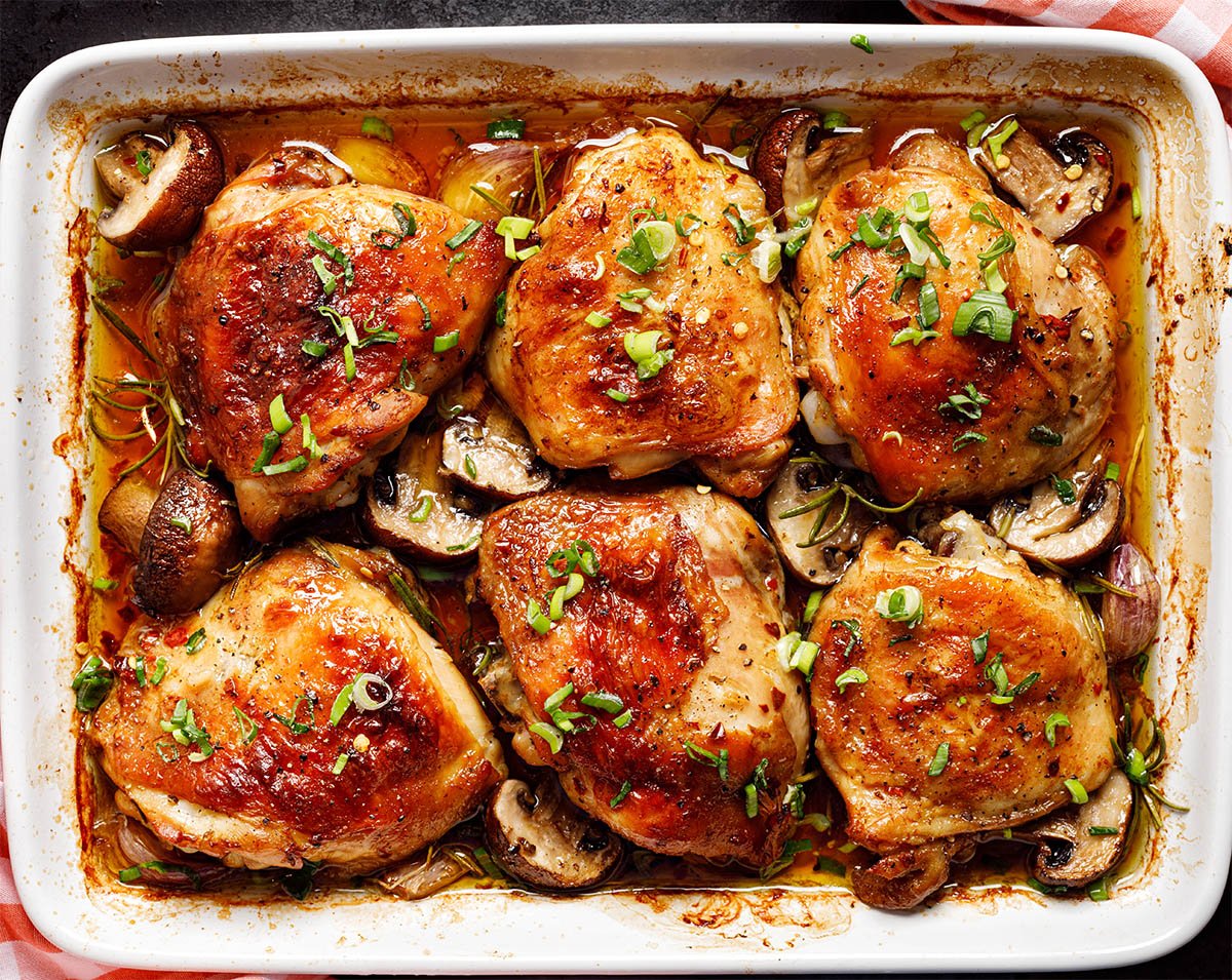 Chicken thighs in a container