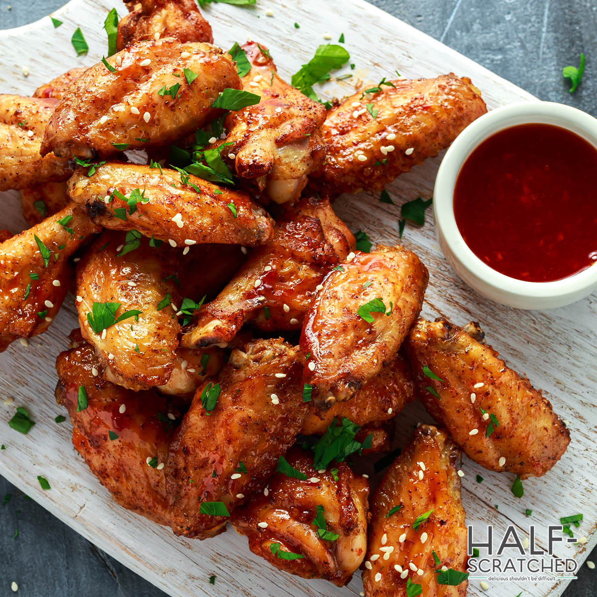Oven baked chicken wings with a dip