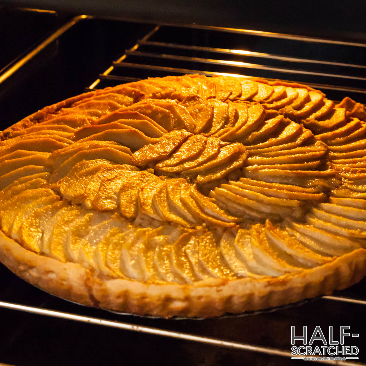 traditional French apple pie in the oven at 375 F