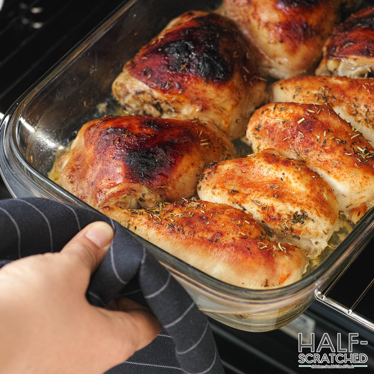 Taking chicken breasts out of the oven