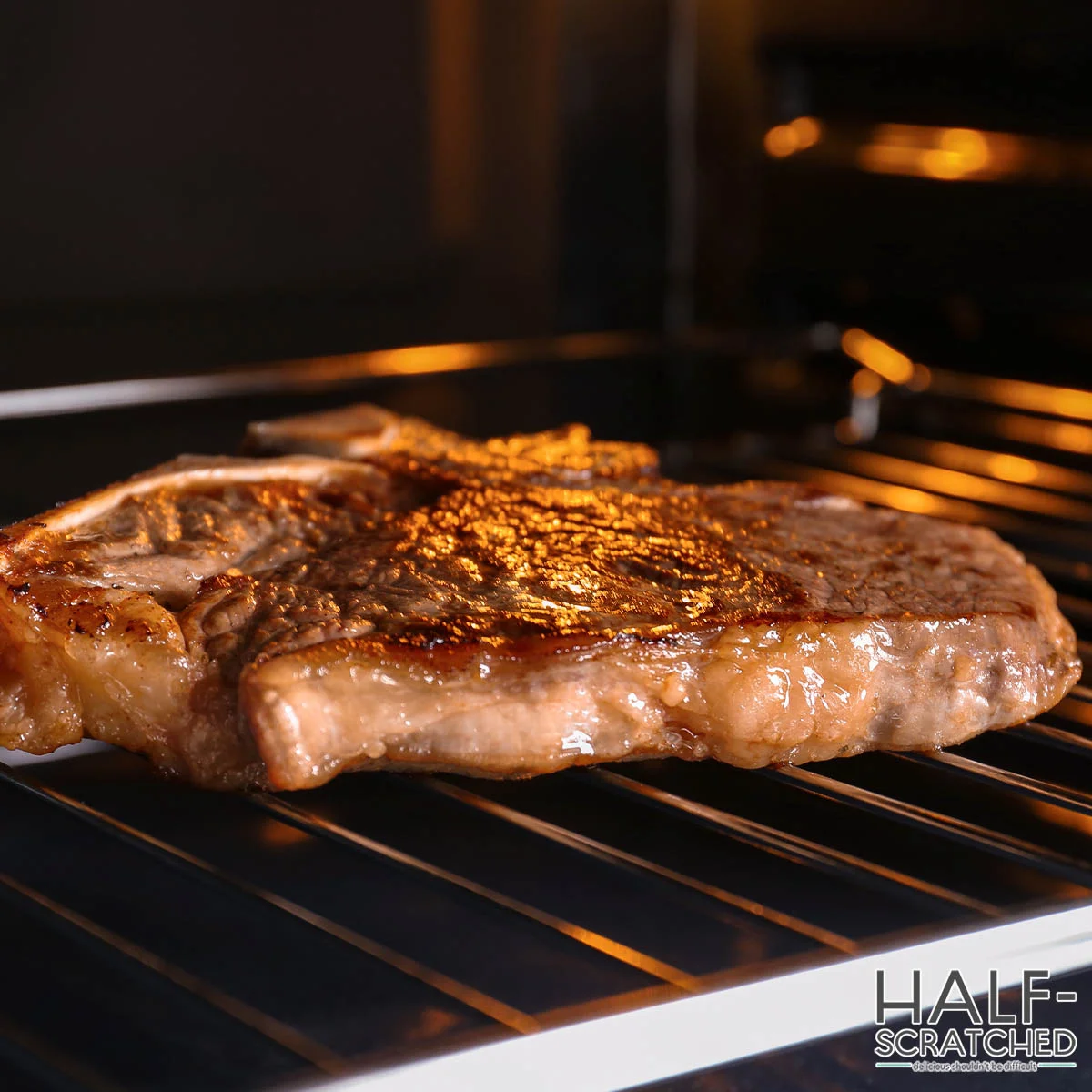 Steak being broiled in the oven