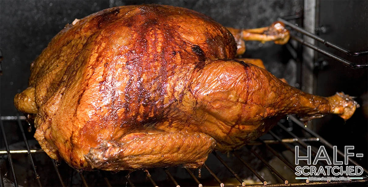 Whole turkey in a smoker