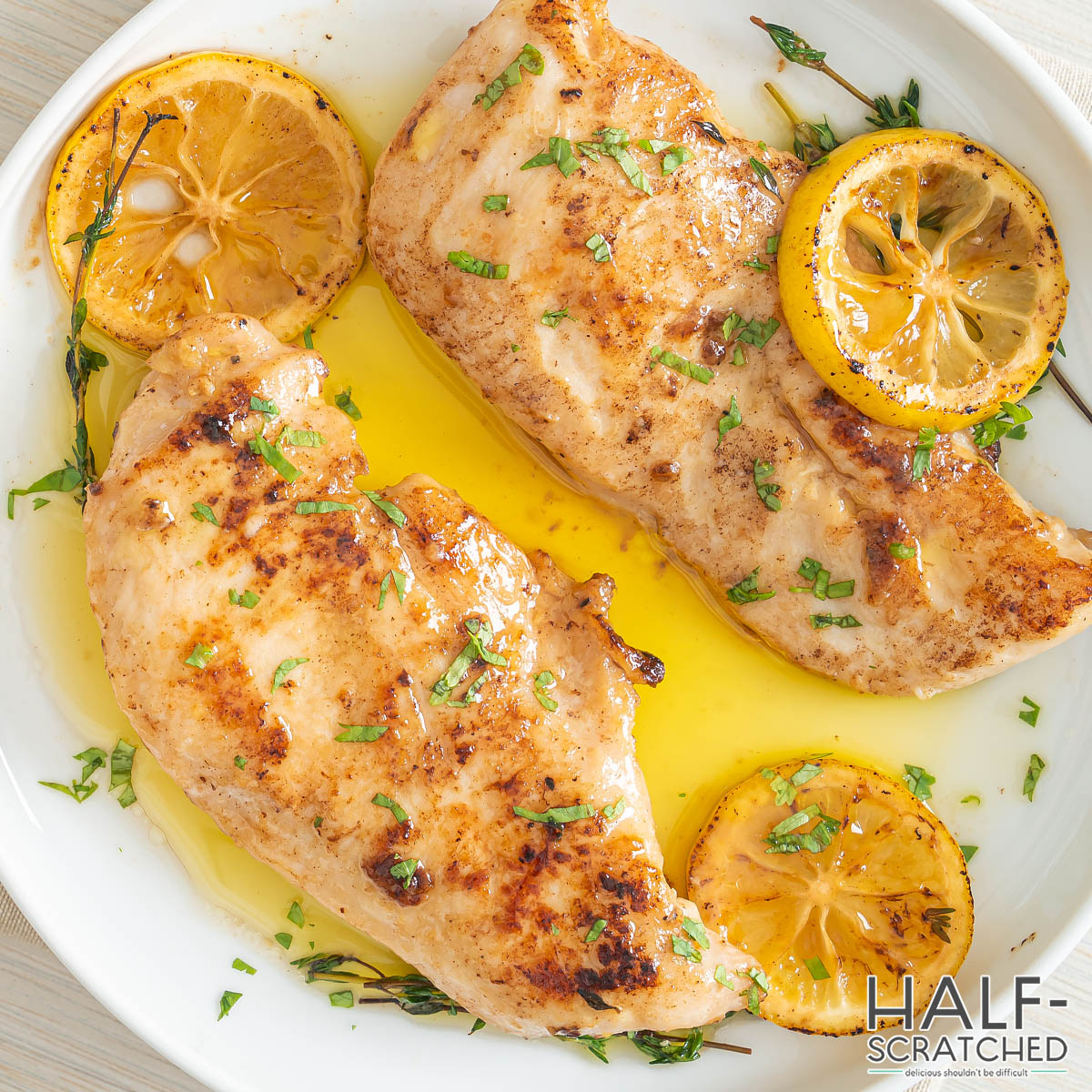 Chicken breasts cooked in oven with lemon