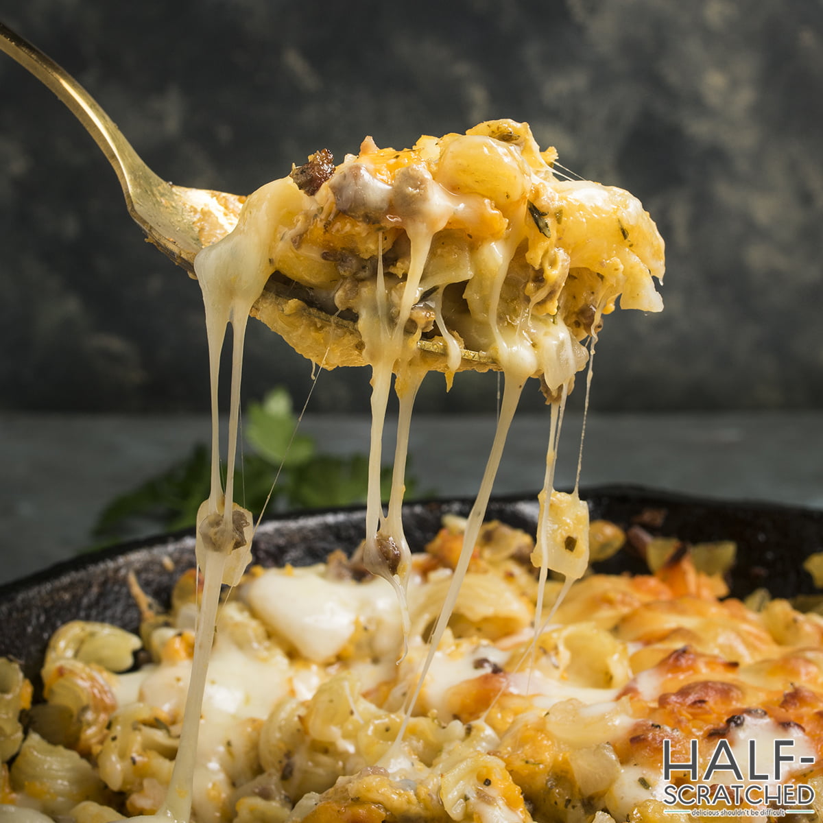 A spoon with Cheeseburger macaroni