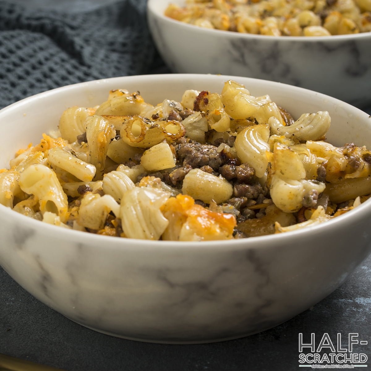 A bowl with chesseburger and macaroni