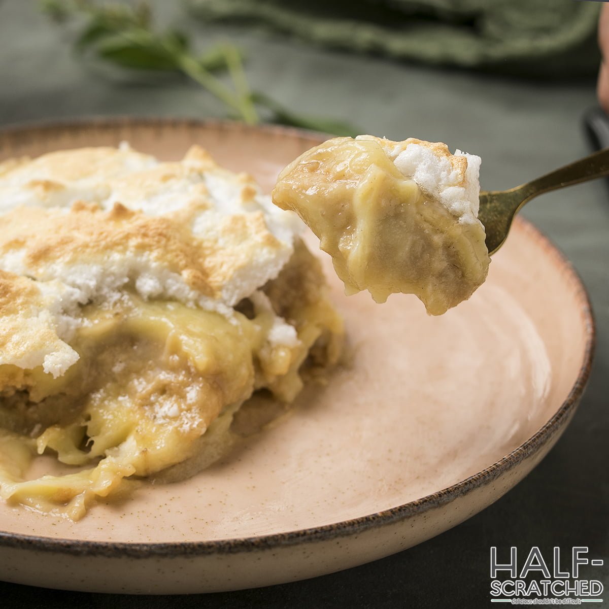 A spoon with Pioneer Woman's banana pudding