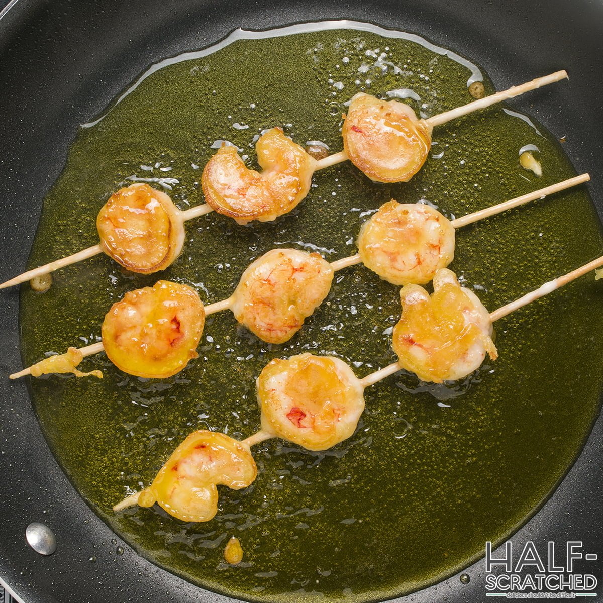 Frying shrimp in a frying pan
