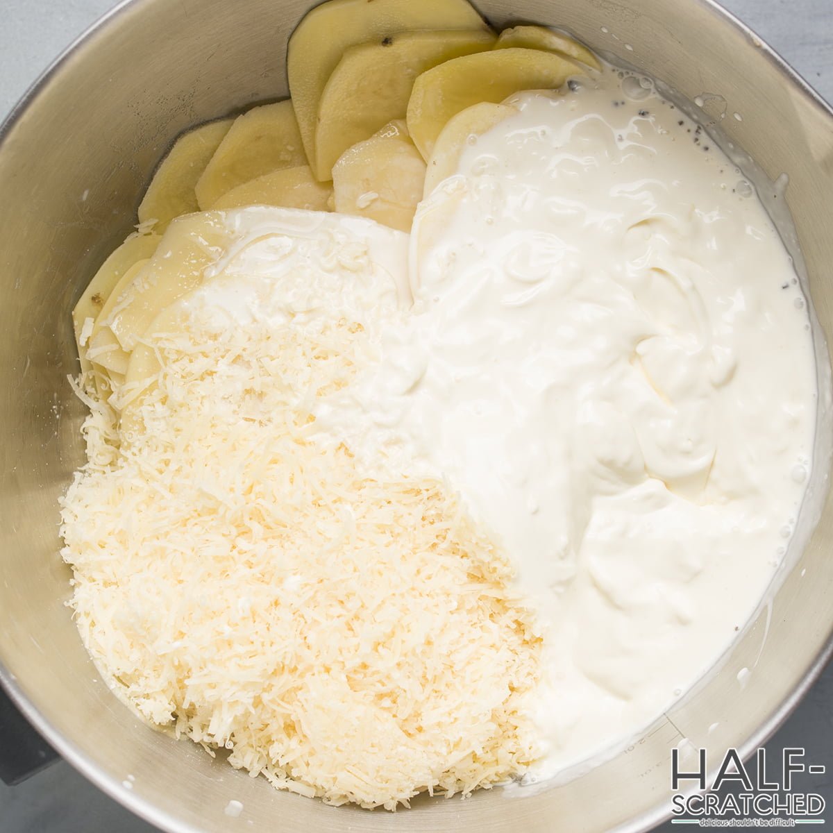 Scalloped potatoes ingredients in a bowl