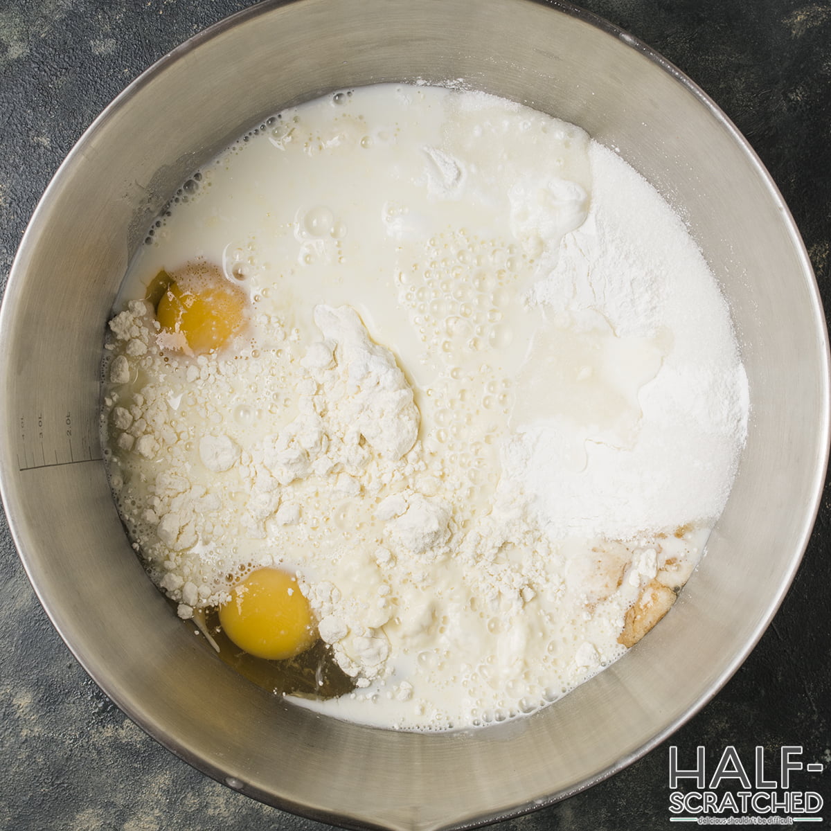 Flour with eggs in a bowl
