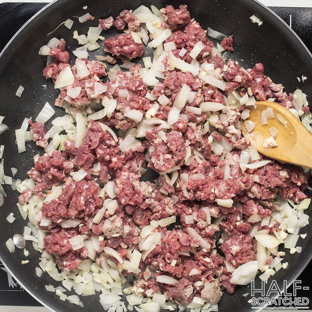 Frying meat and onion