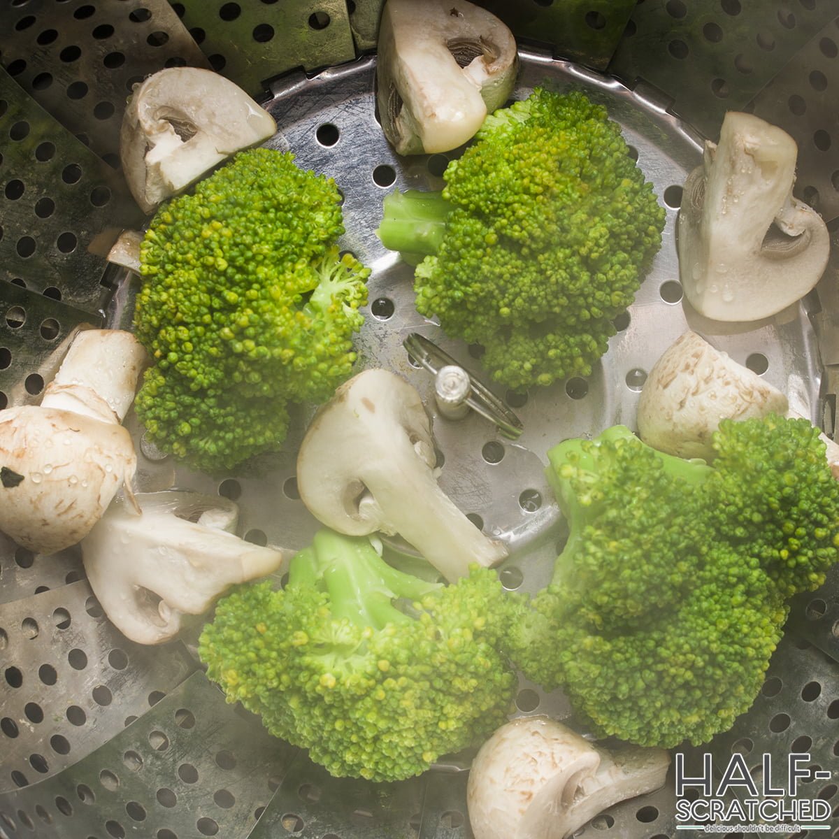 Steaming broccoli and mushrooms