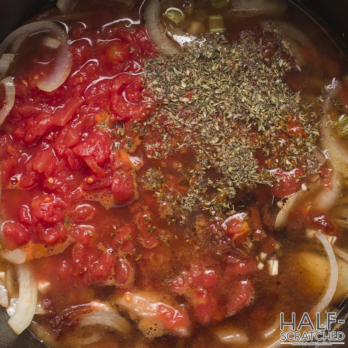 Tomato sauce and seasonings in a pot