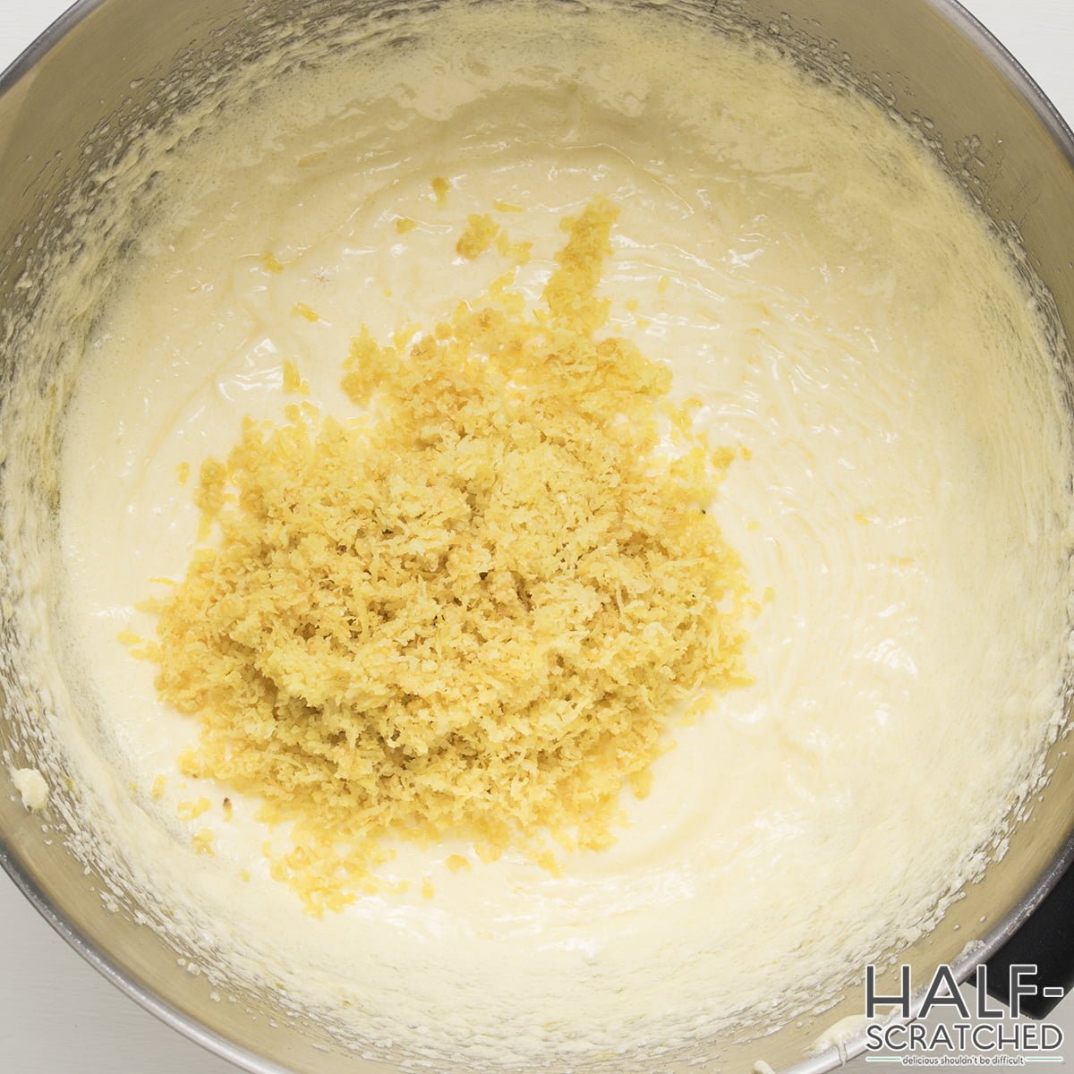 Adding lemon zest to a mixture