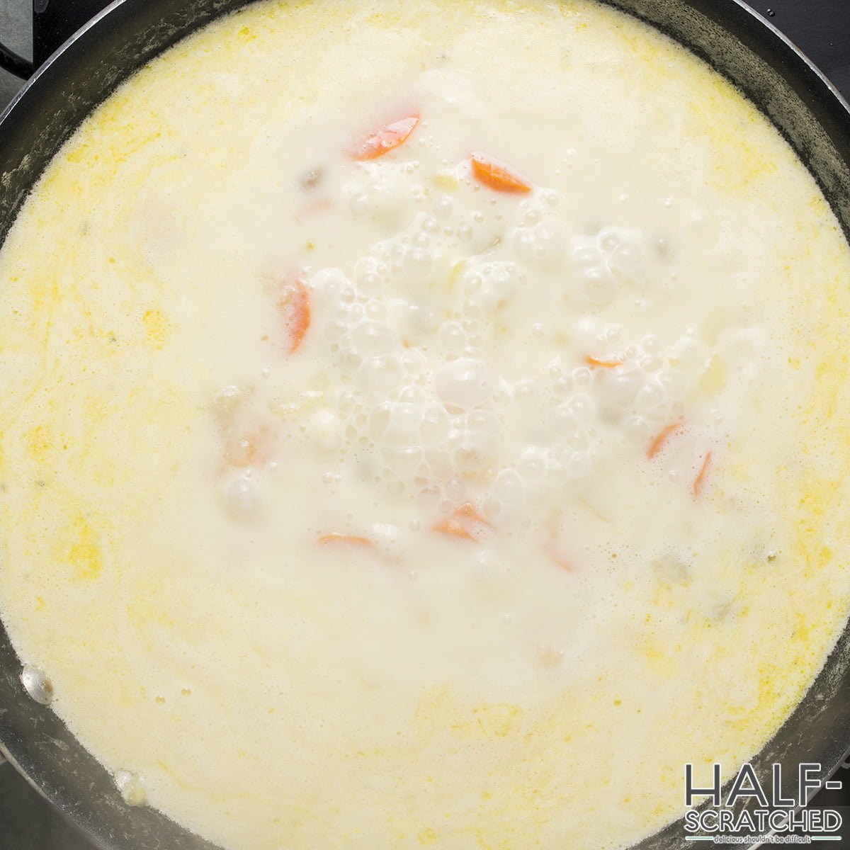 Carrots and cream in a skillet