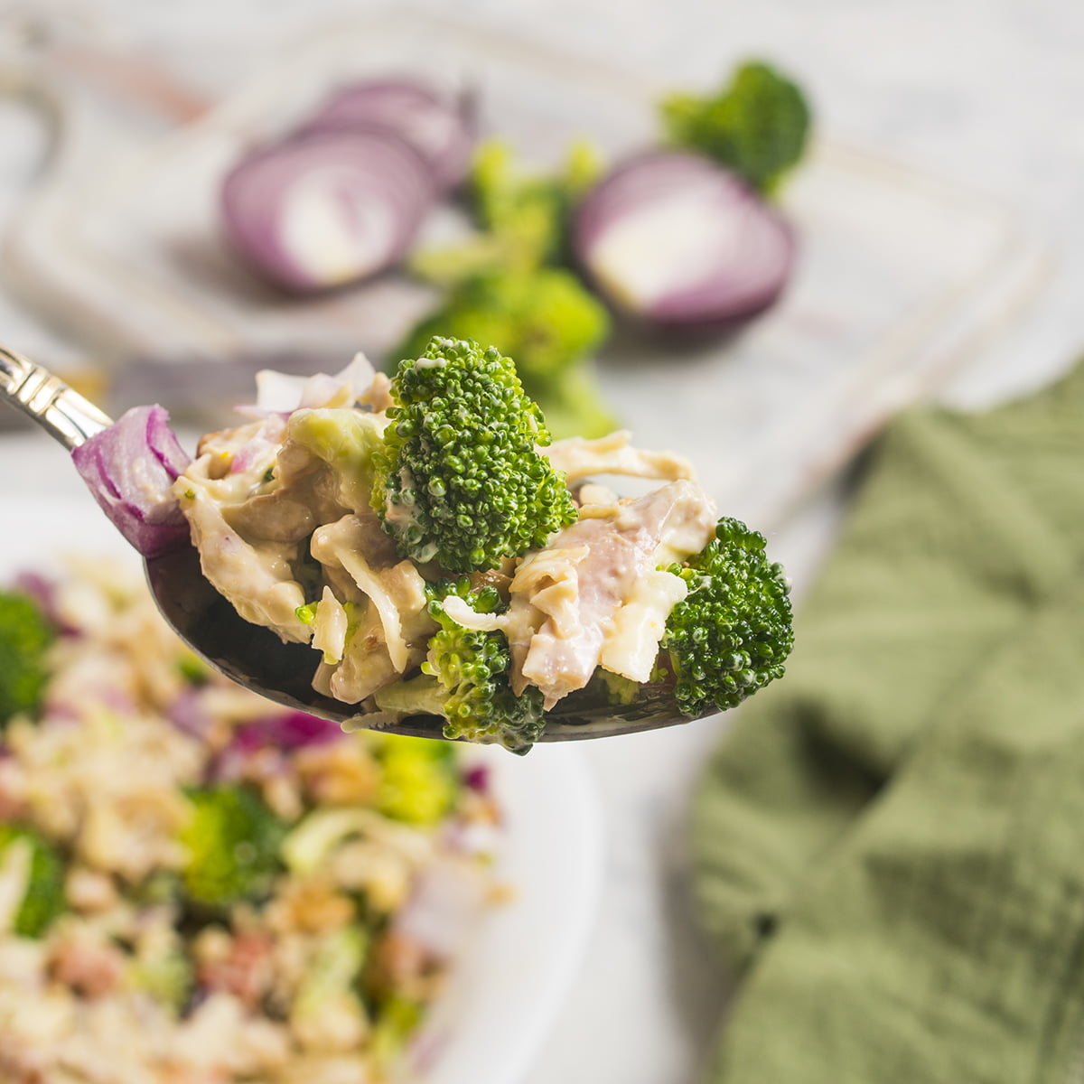 A spoonful of Chicken Salad Chick Broccoli Salad