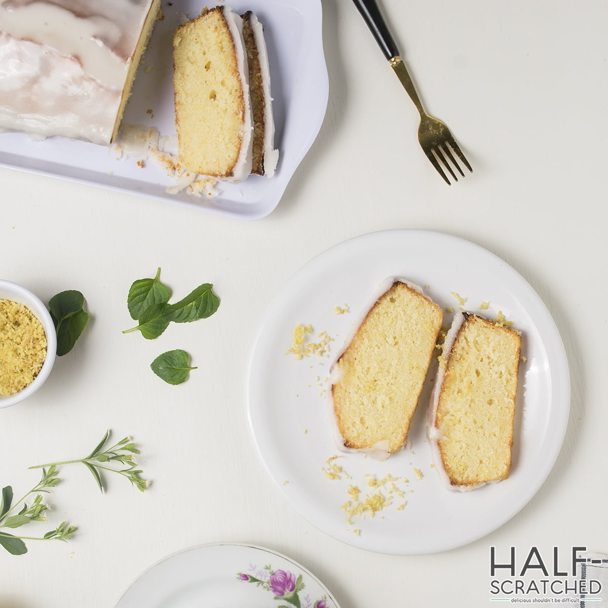 A white plate with lemon cake slices