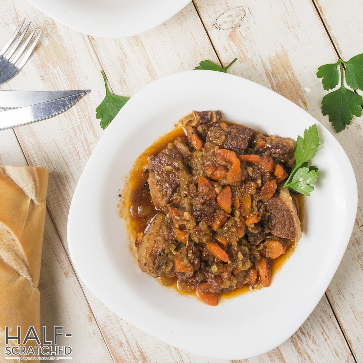 A plate with Braised short ribs