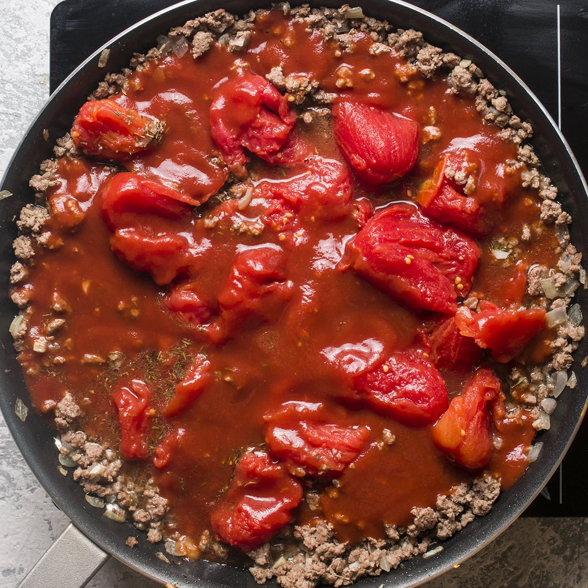 Adding tomatoes