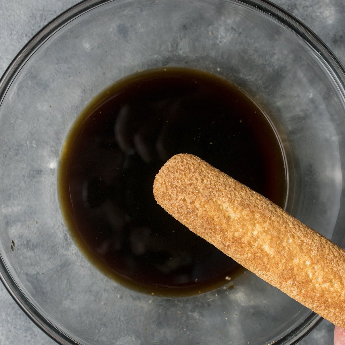 Soaking ladyfingers 