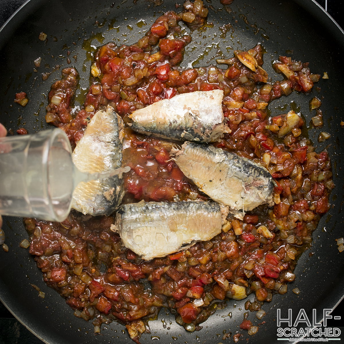 Adding lemon juice to sardines in tomato sauce recipe