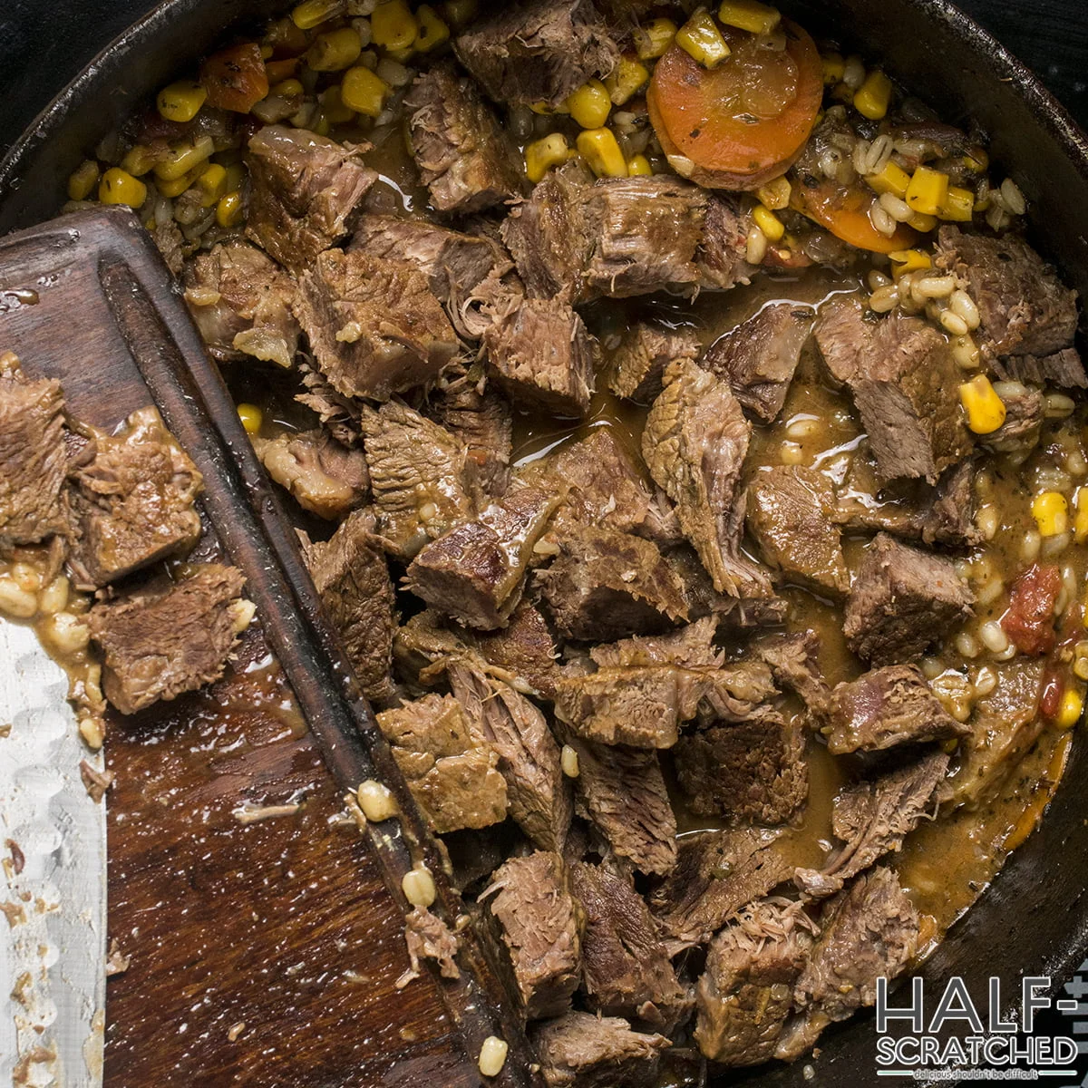 Adding meat to the beef and barley soup