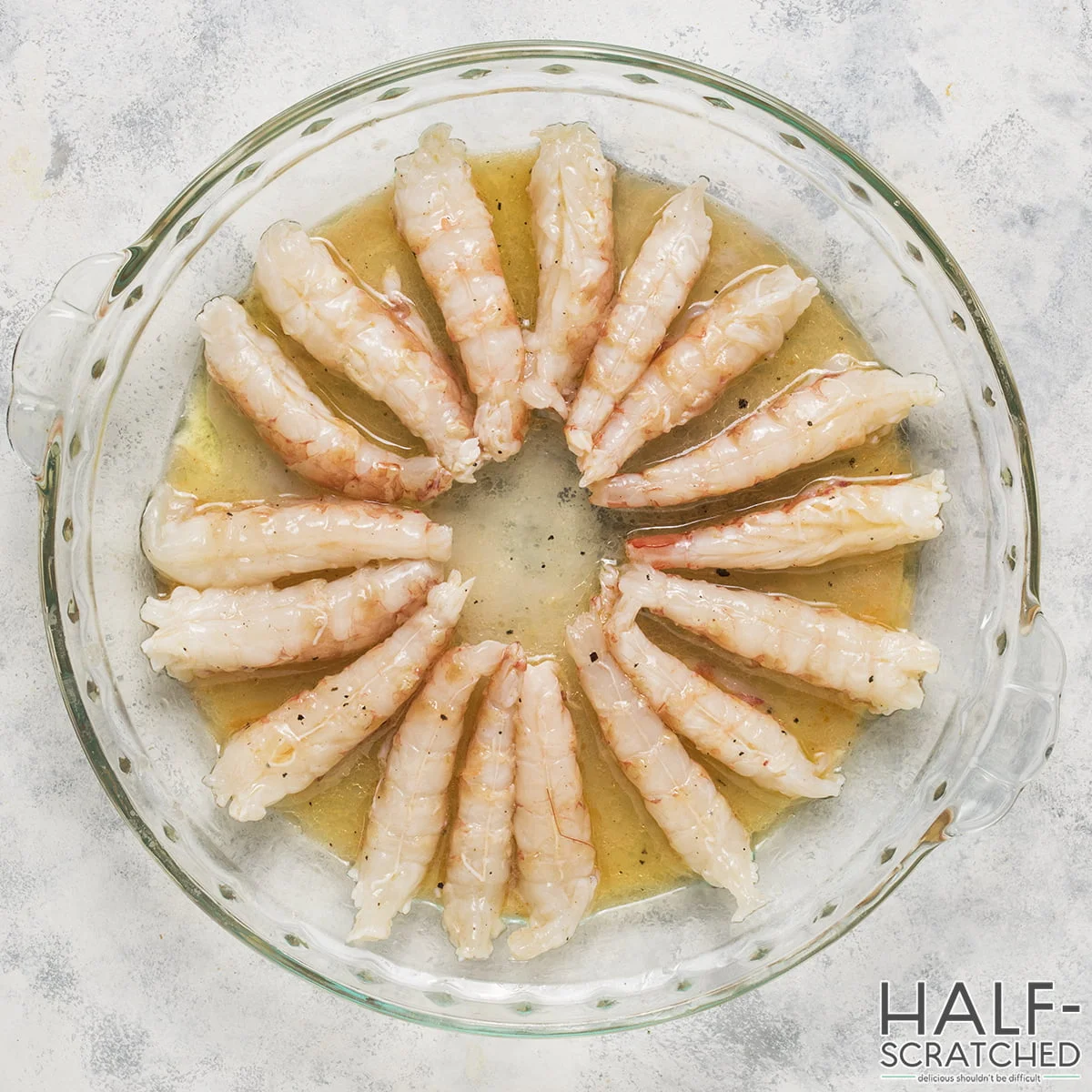 Shrimp marinaded in baking dish